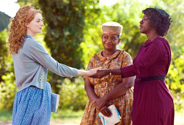 "THE HELP" 946_D_08558R In Jackson, Mississippi in 1963, (left to right) Skeeter Phelan (Emma Stone), Minnie Jackson (Octavia Spencer) and Aibileen Clark (Viola Davis) together take a risk that could have profound consequences for them all in DreamWorks Pictures' drama, "The Help", based on the New York Times best-selling novel by Kathryn Stockett. Ph: Dale Robinette ©DreamWorks II Distribution Co., LLC.  All Rights Reserved.